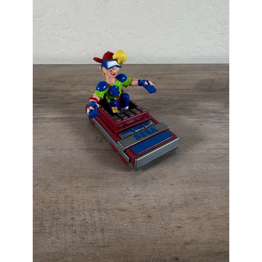 Sega of America, Boy in car - Burger King 1990 Happy Meal toy